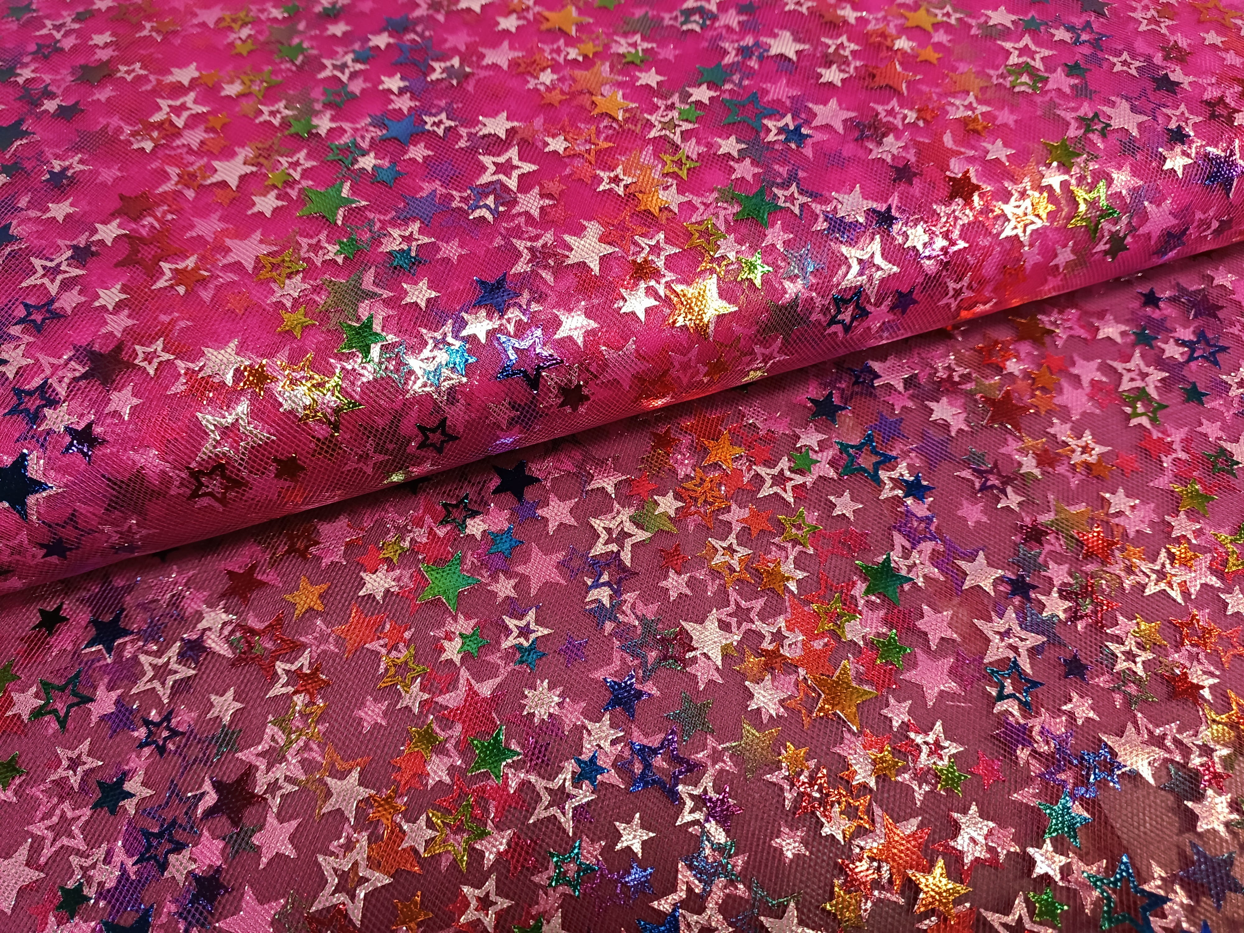 Tüll Stoff "Twinkle" mit bunten Sternen von Swafing - pink