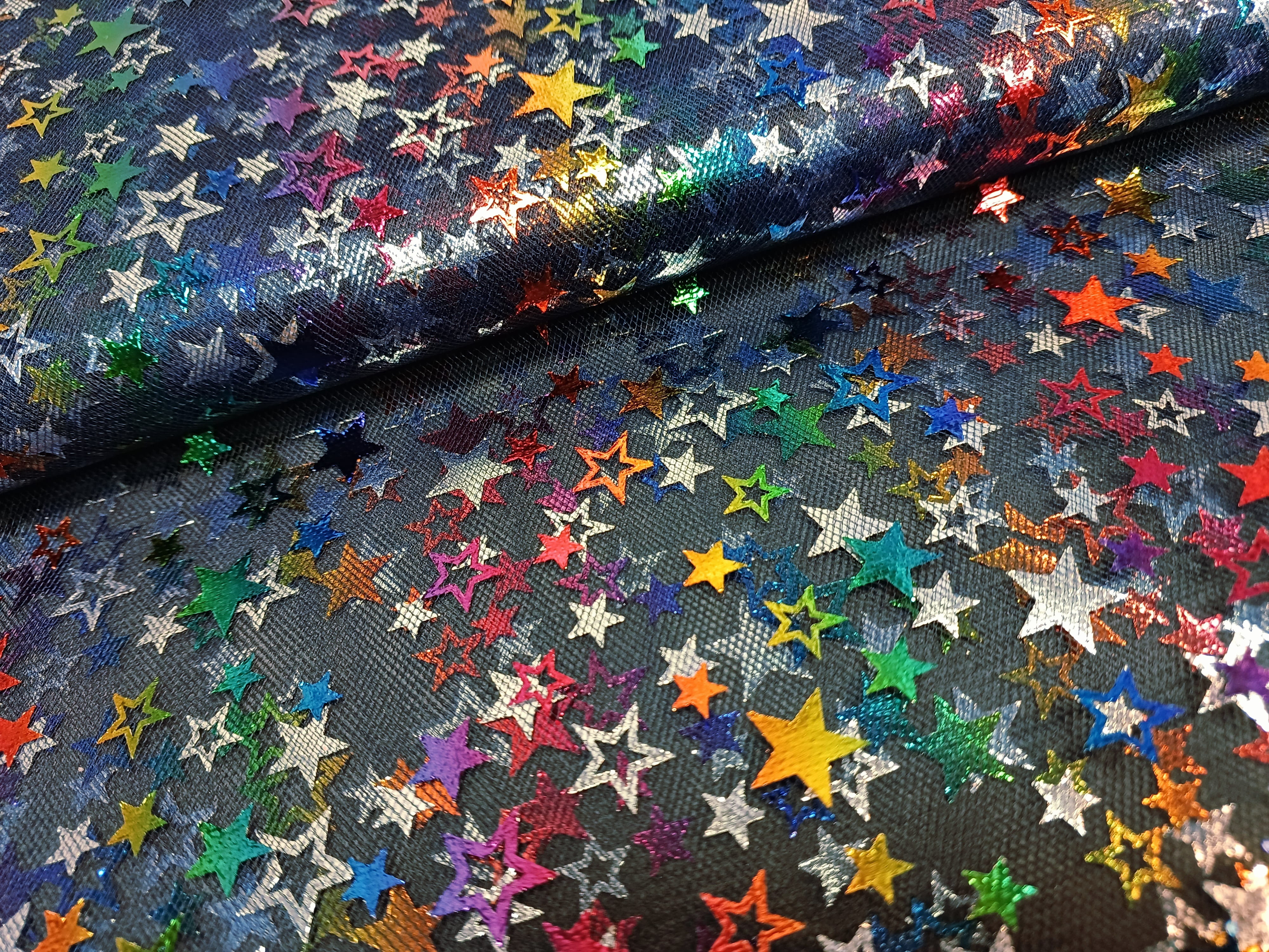 Tüll Stoff "Twinkle" mit bunten Sternen von Swafing - navy