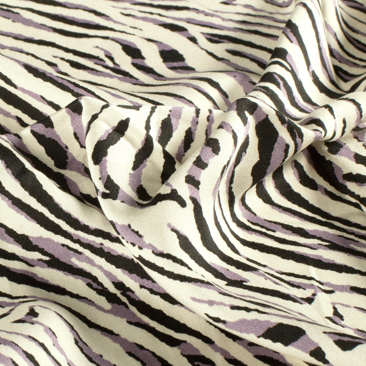 Viskosesatin mit Zebra-Muster - schwarz/weiß/dusty lila