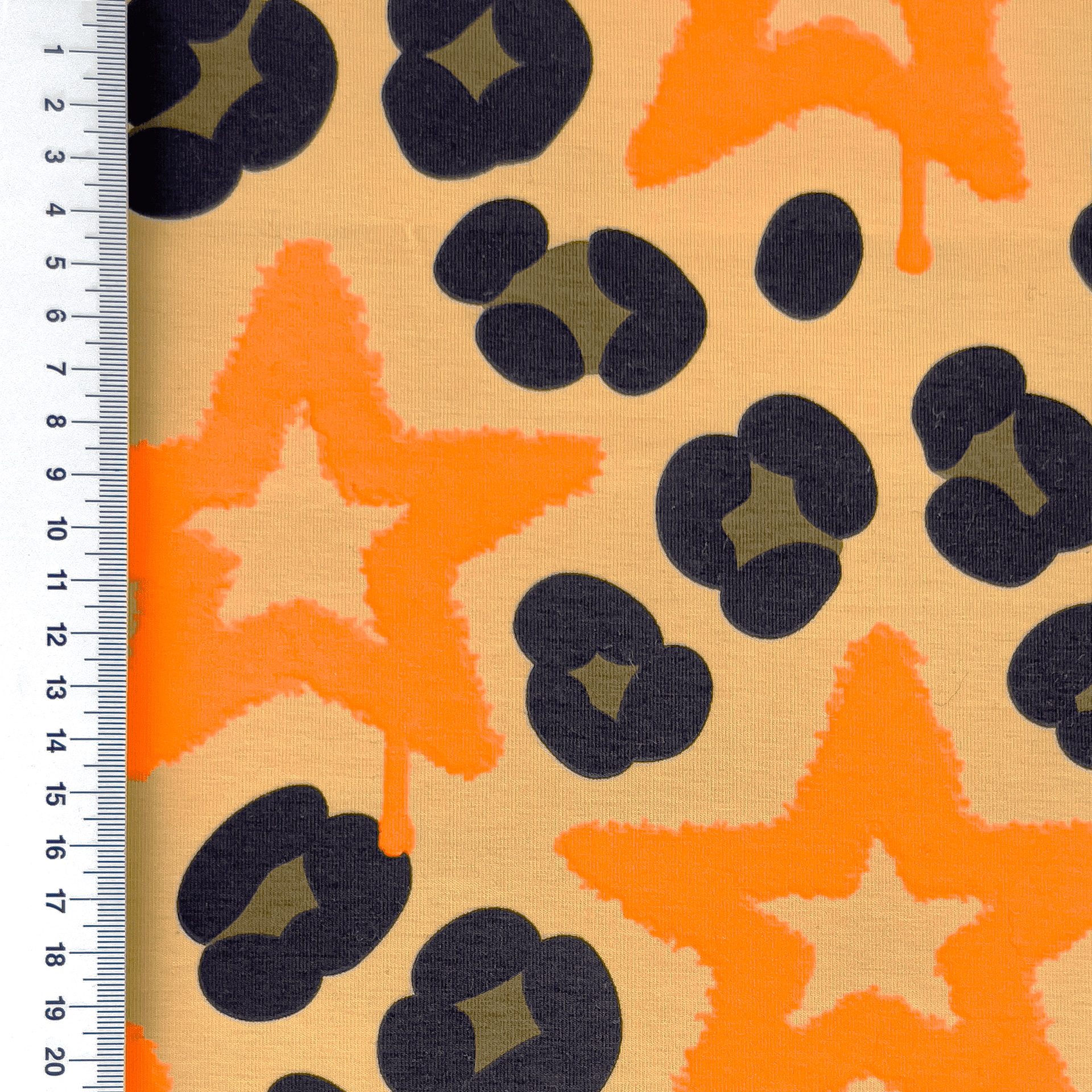 Baumwolljersey Digital mit neonorangen Sternen und Leopardenmuster - beige