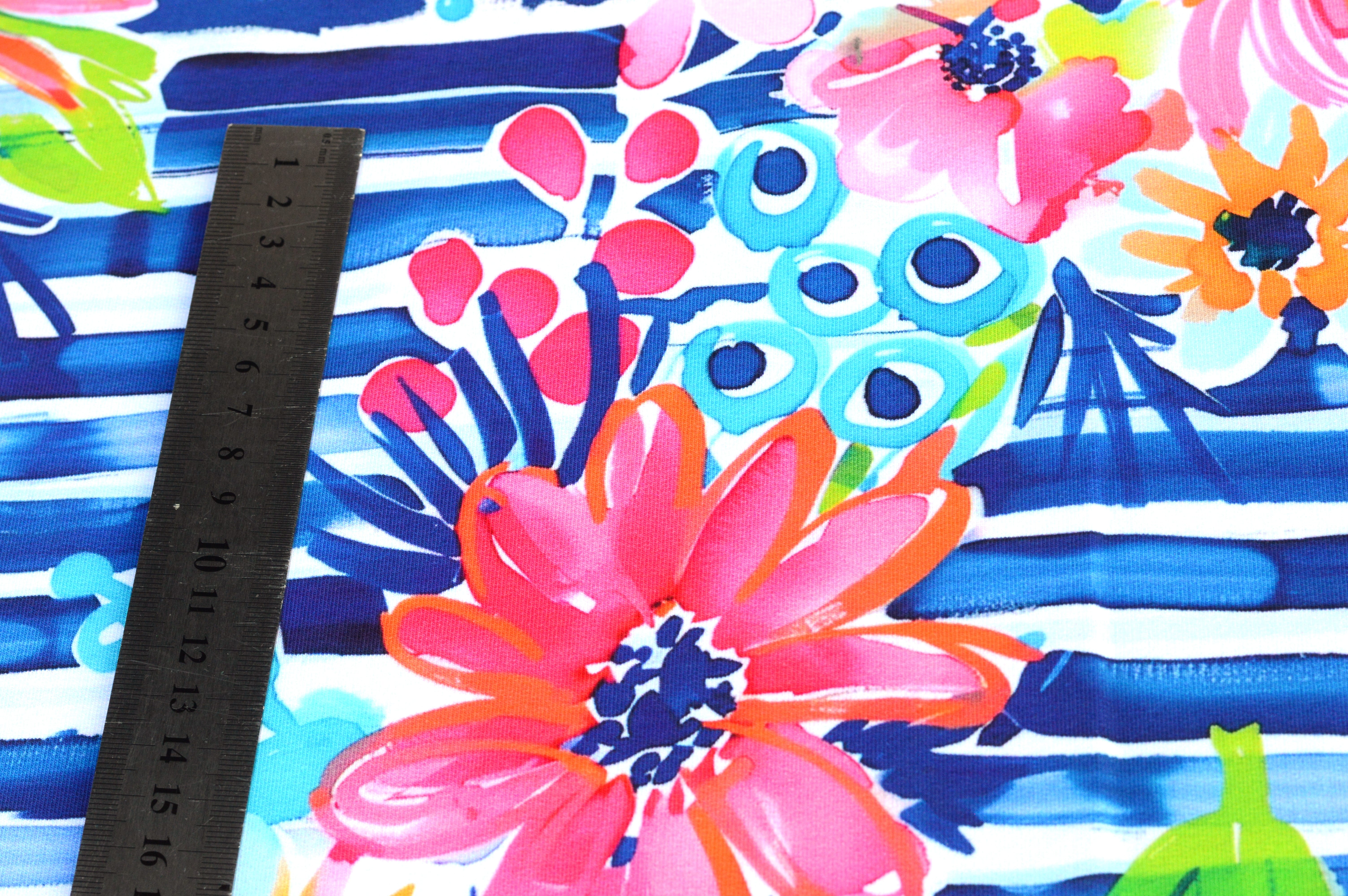 French Terry Digital Eigenproduktion "Tropical Blossom" mit tropischen Blumen - blau/weiß gestreift