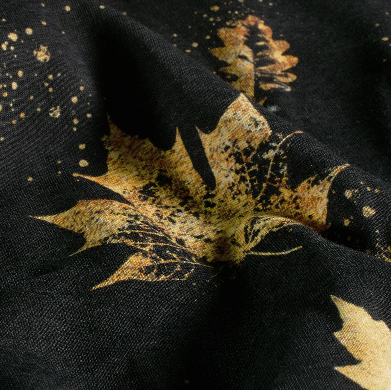 Sweatstoff Glitzerpüppi mit Blättern - schwarz (N069)